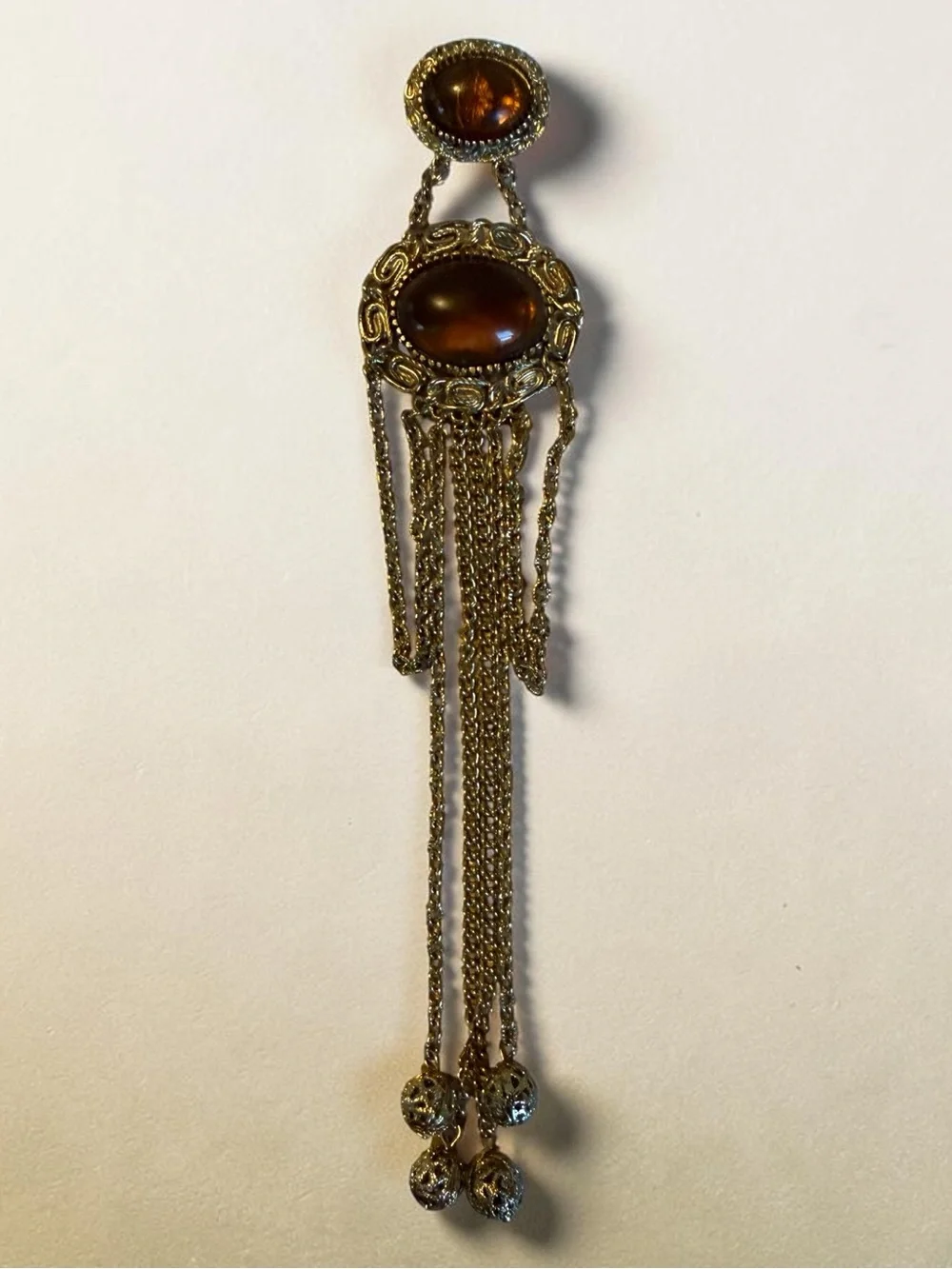 Vintage Gold-Tone Filigree Pendant Brooch with Amber Stone and Chain Tassels